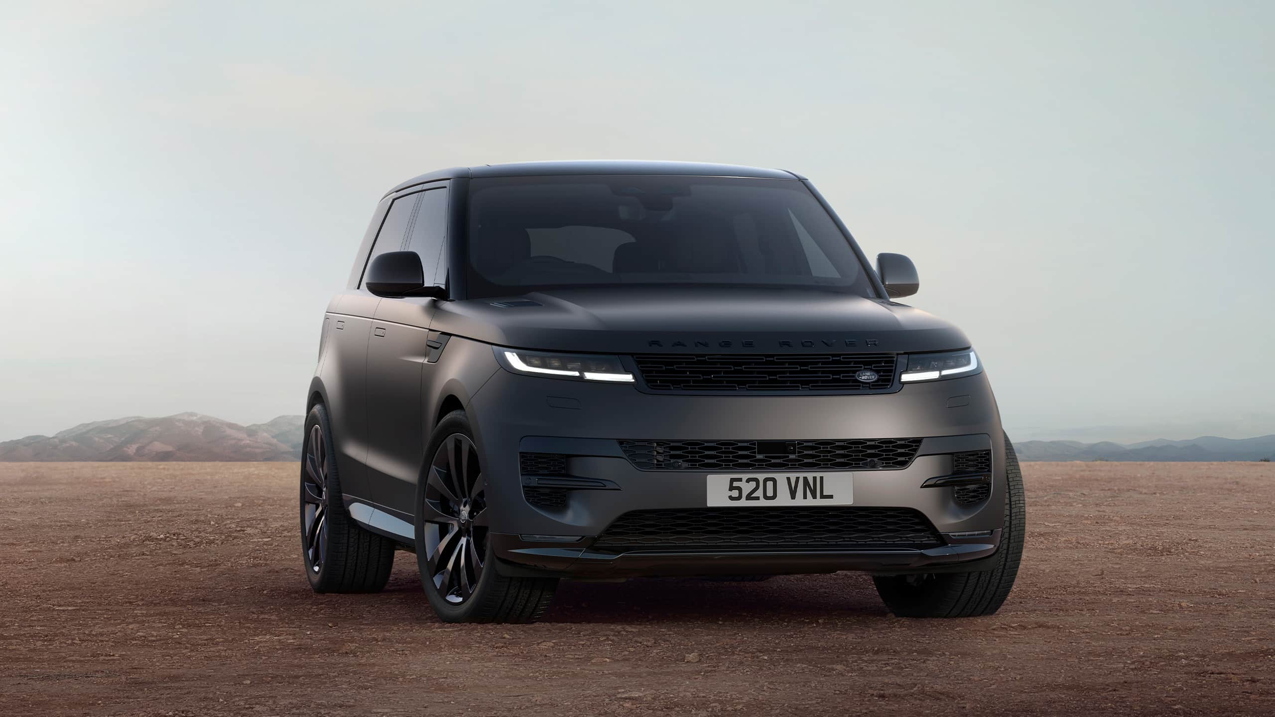 Range Rover Sports parked on plain ground